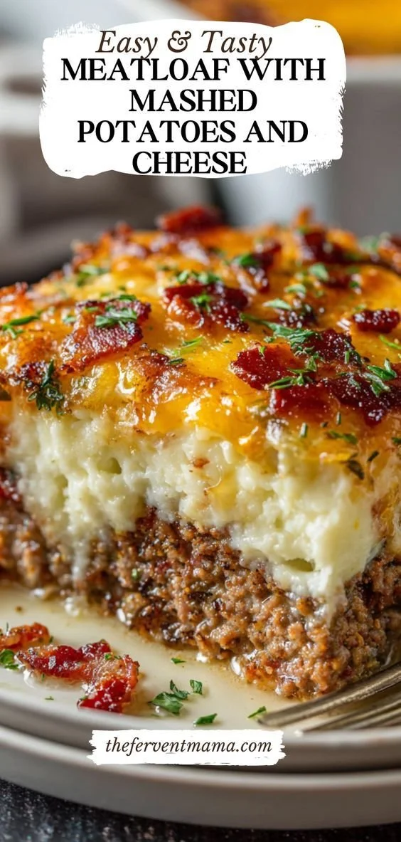 Delicious homemade meatloaf served with creamy mashed potatoes and melted cheese
