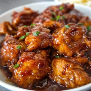 Sweet Hawaiian Crock Pot Chicken served in a bowl with colorful vegetables.